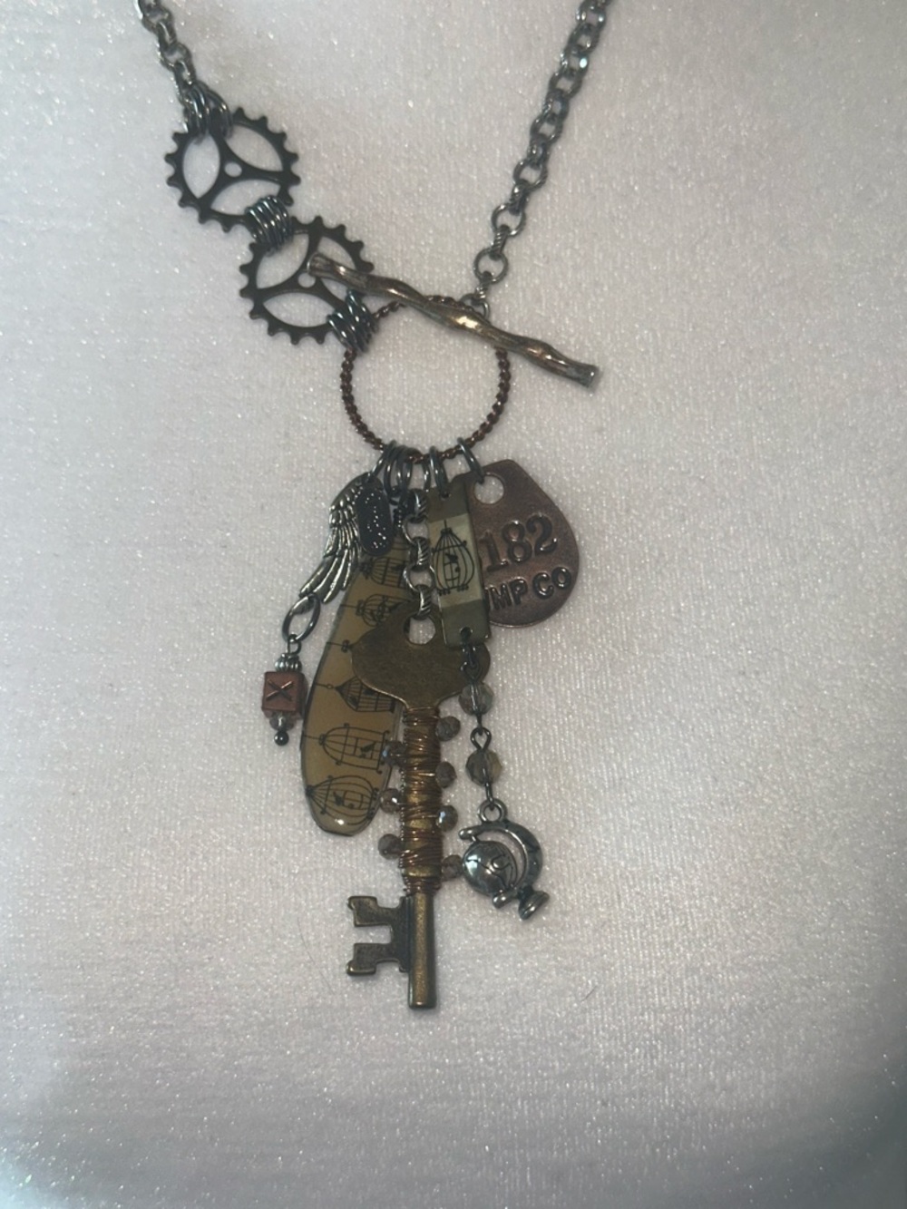 Treska Antique Brass and Silver Key & Charm Necklace